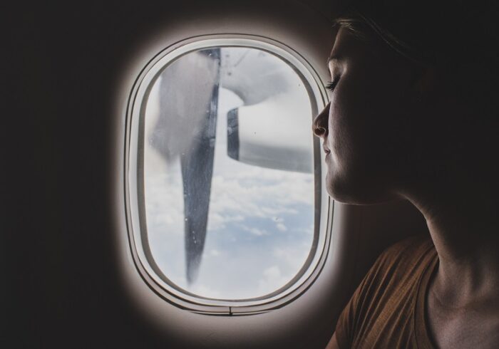 An airplane's window seat can make it easier to fall asleep on long flights.
